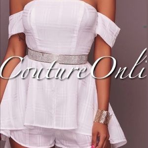 White romper with a trail